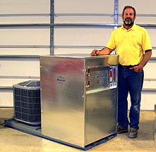 Mark Hensley standing next to his first production water jet chiller